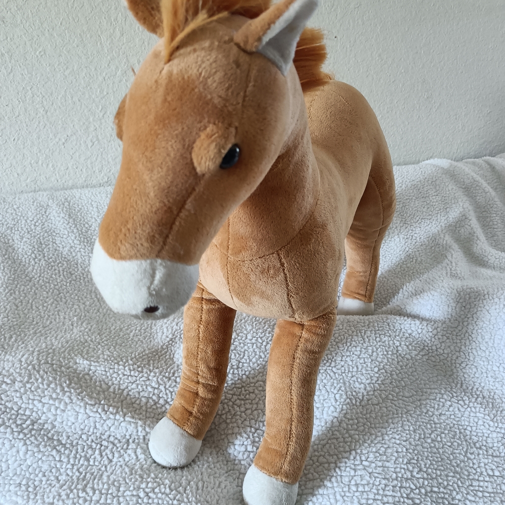 Brown and White Stuffed Horse Toy